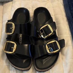 Birkenstock Black Sandals with Gold Accents